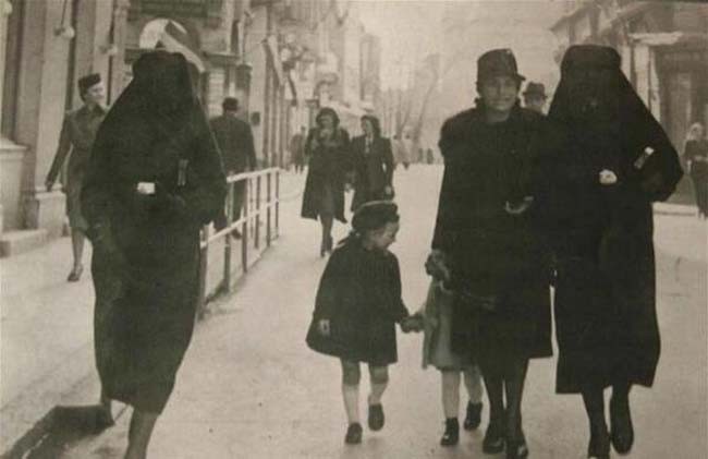 10. A muslim woman covers the yellow star of her Jewish neighbour saving her from prosecution