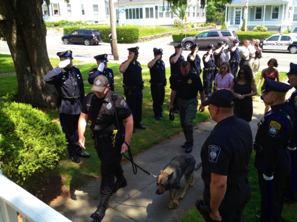 3. Officers gave Kaiser a final salute he made his way to the vet for the last Plymouth Police Working Dog Foun