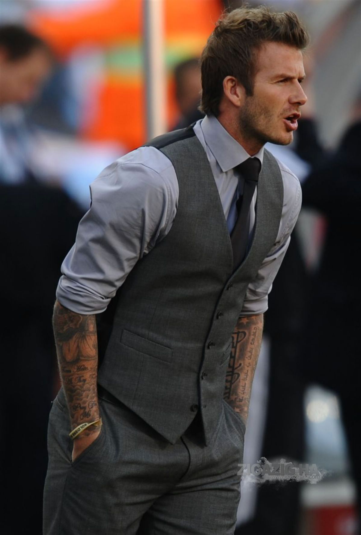 Opt for a charcoal or gray suit over black